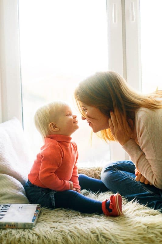 mom with smiling child